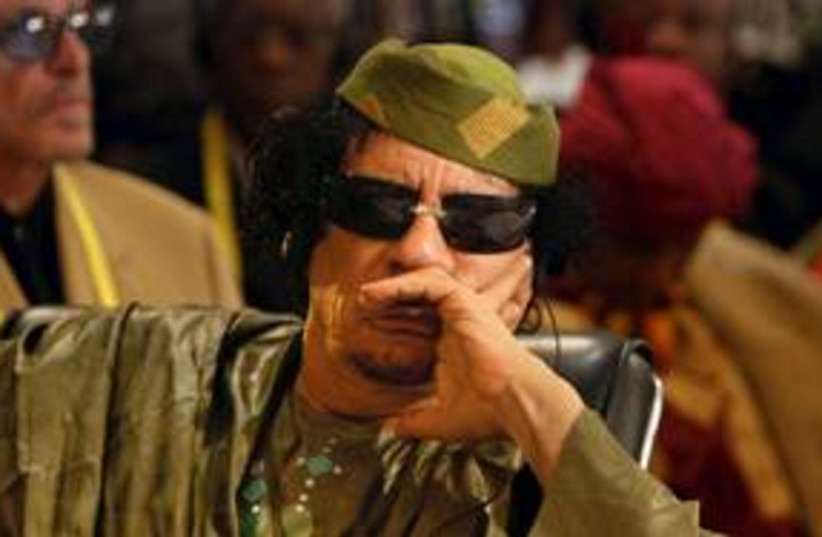 Former Libyan leader Muammar Gaddafi 311 (R) (photo credit: Reuters)