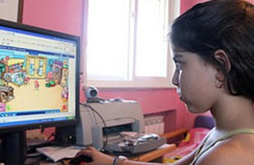 Girl on computer (photo credit: Ariel Jerozolimski)
