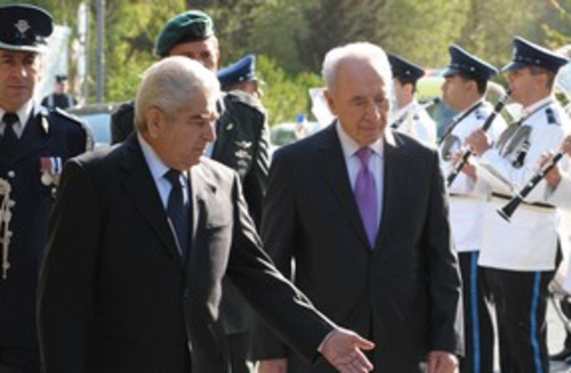 Peres and Cypriot president Christofias 311 (photo credit: Moshe Milner /  GPO)
