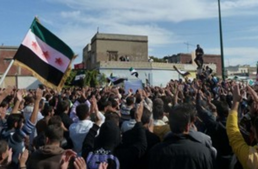 anti-Assad protests near Homs_311 (photo credit: Reuters)
