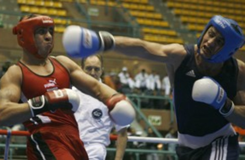 Syrian and Jordanian boxers at the Pan-Arab Games 311 (R) (photo credit: Amr Dalsh / Reuters)