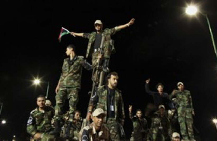 Libyan revolutionaries in parade_311 (photo credit: Reuters)