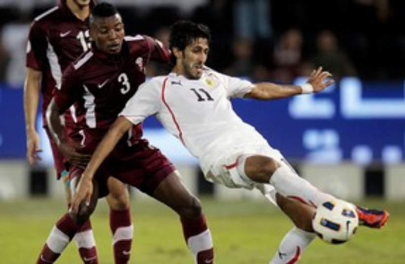Qatar football player 311 (R) (photo credit: REUTERS/Fadi Al-Assaad)