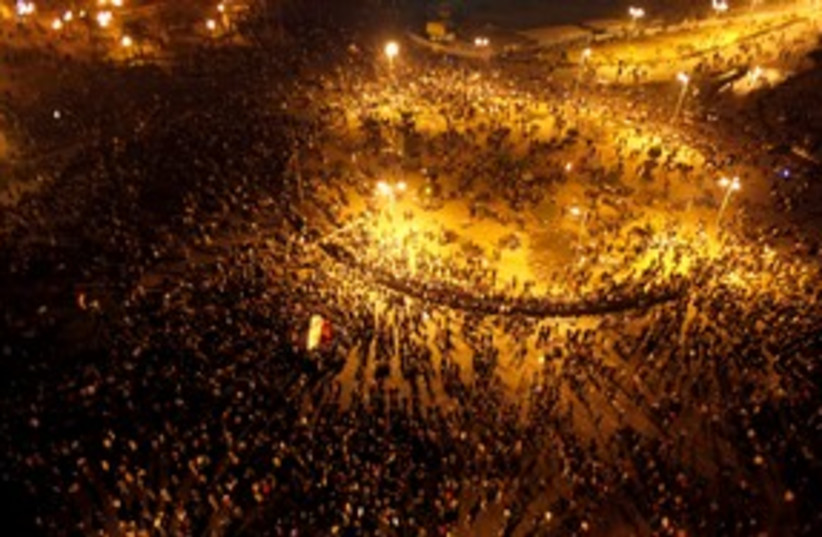 Tahrir Square protest at night 311 (photo credit: REUTERS)