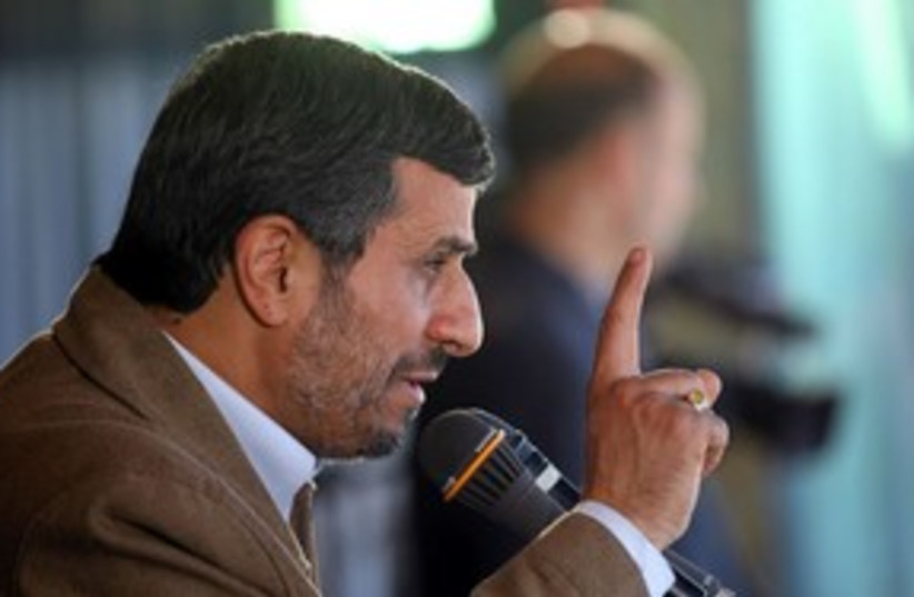 Ahmadinejad scolds child 311 (photo credit: REUTERS)