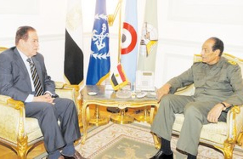 New Egyptian PM Kamal Ganzouri meets Tantawi 311 (photo credit: Reuters)