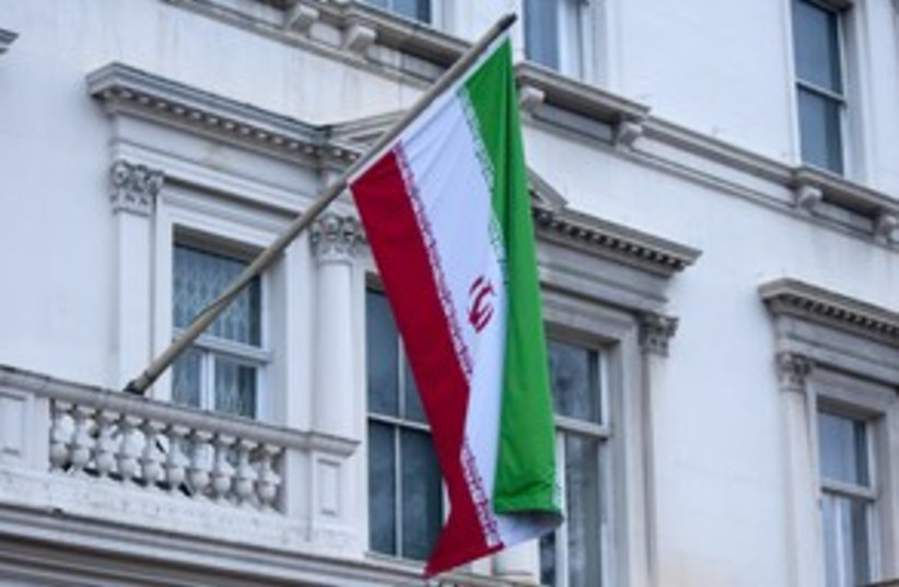 Iran flag at Britain embassy 311 R (photo credit: REUTERS/Stringer .)