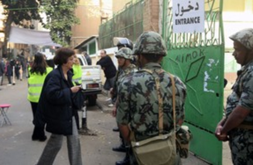 Egyptian woman voting 311 R (photo credit: REUTERS/Esam Al-Fetori )