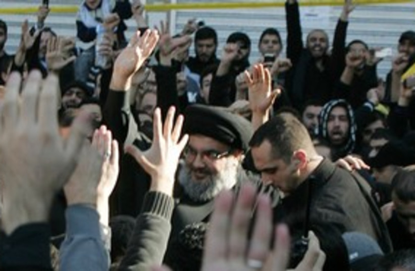 Hezbollah leader Hassan Nasrallah seen in public (R) 311 (photo credit: REUTERS/ Issam Kobeisy)