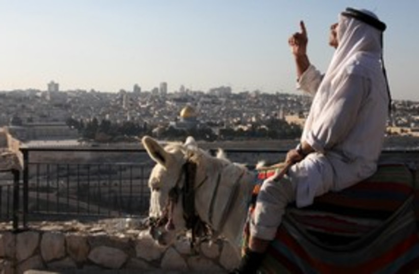 View of  Jerusalem Old City, Arab man_311 (photo credit: Marc Israel Sellem)