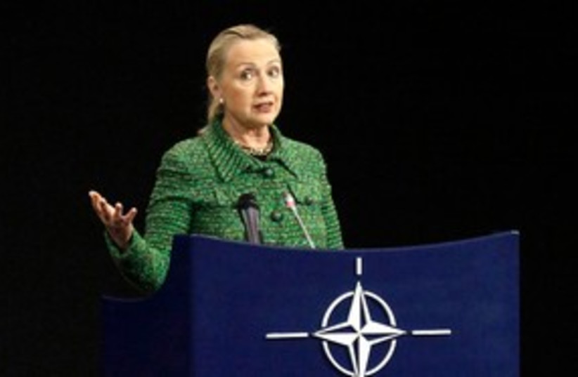 US Secretary of State Hillary Clinton at NATO HQ 311 (R) (photo credit: REUTERS/Sebastien Pirlet)