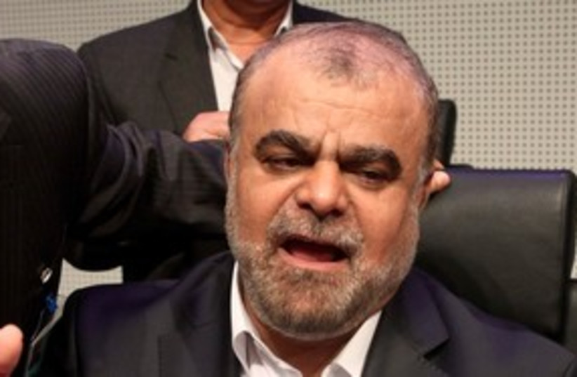 Iranian Oil Minister Rostam Qasemi 311 (R) (photo credit: REUTERS/Heinz-Peter Bader)