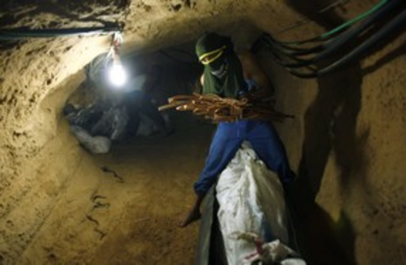 Gaza tunnel smuggling palestinian 311 (photo credit: Ibraheem Abu Mustafa / Reuters)