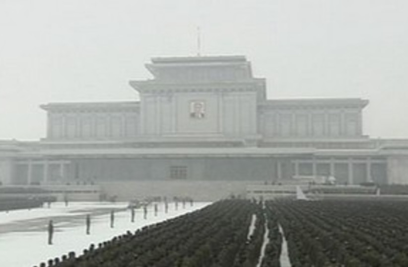 Kim Jong-il's funeral procession 311 R (photo credit: REUTERS)
