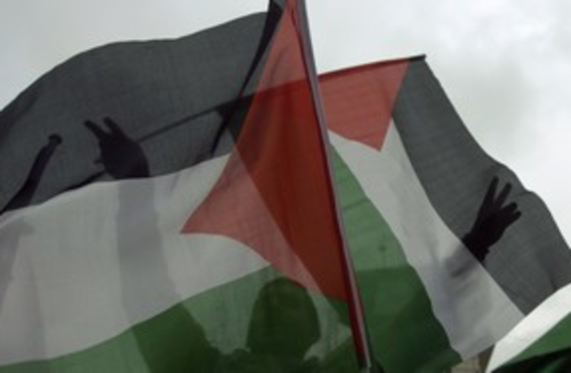 Palestinian flags in Ramallah 311 (R) (photo credit: Fadi Arouri / Reuters)