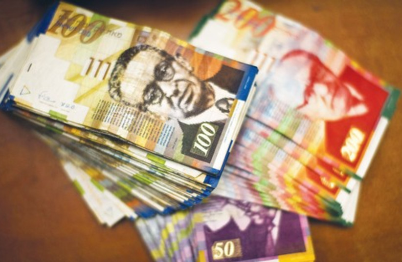 Money cash Shekels currency 521 (photo credit: Reuters)