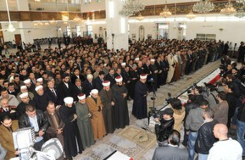 Syria sucide attack funeral 311 (photo credit: REUTERS)