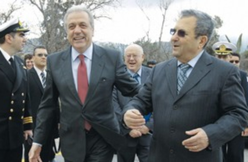 Barak with GREECE DEFENSE MINISTER Dimitris Avramopoulos 311 (photo credit: Yiorgos Karahalis/Reuters)