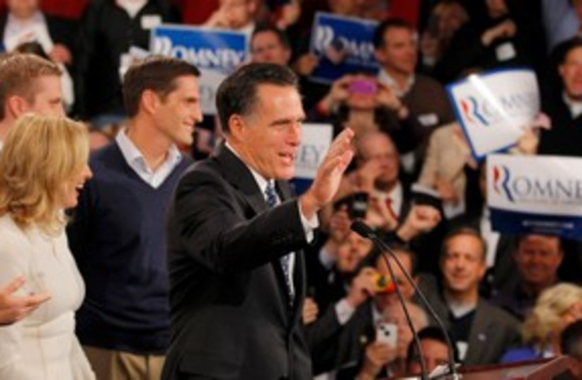 Republican Mitt Romney gives victory speech in NH 311 (R) (photo credit: REUTERS/Brian Snyder)