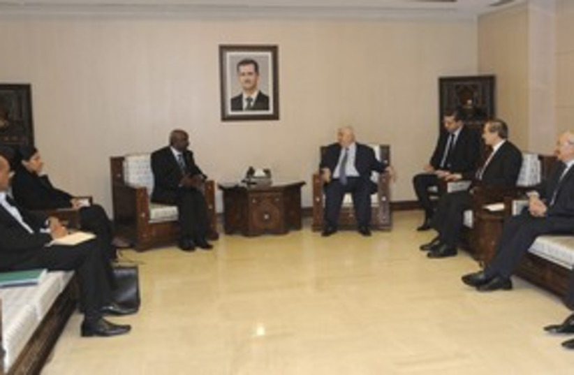 Syrian FM meets head of  Arab monitors 311 R (photo credit: REUTERS/Sana Sana)