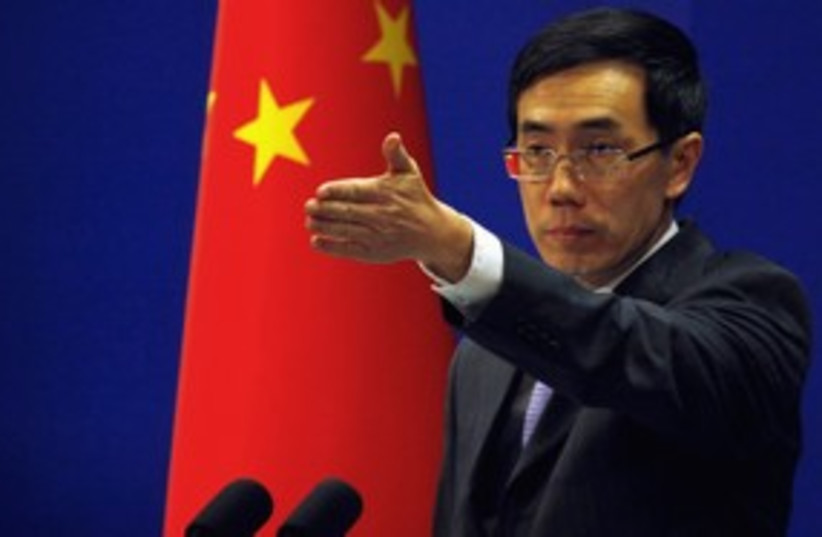 China's Foreign Ministry spokesman Liu Weimin 311 R (photo credit: REUTERS/David Gray)