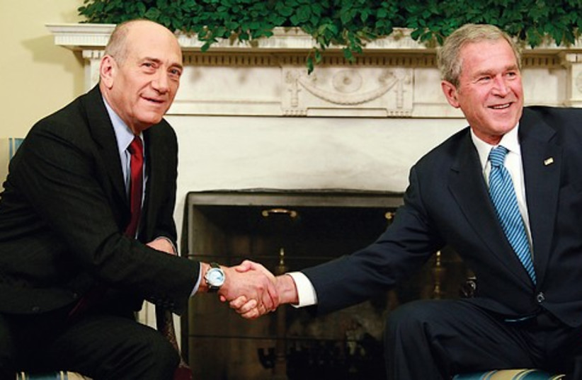 Ehud Olmert & Geroge W Bush 521 (photo credit: REUTERS)