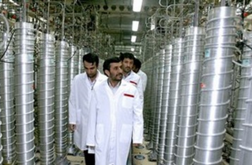 Iranian President Ahmadinejad at nuclear facility 390 (R) (photo credit: Ho New / Reuters)