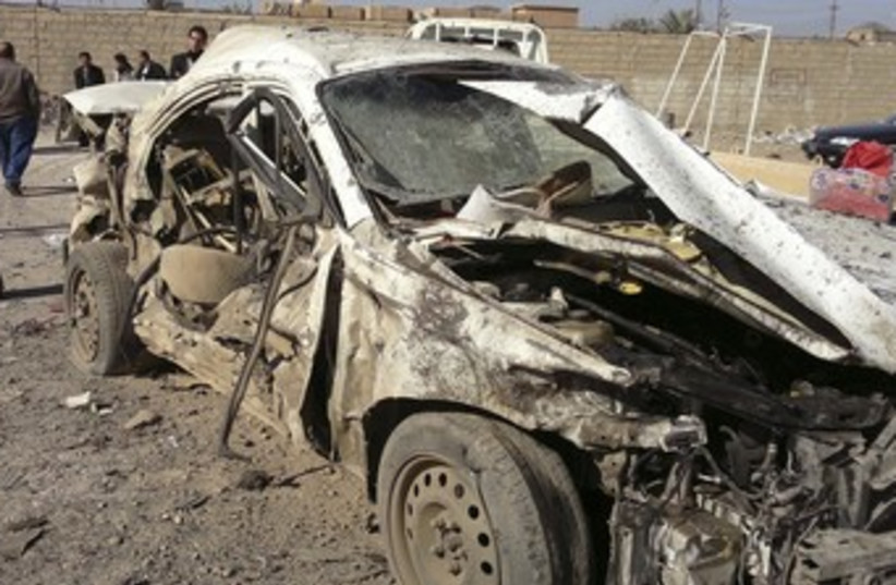 Aftermath of Iraqi bomb attack 370 (photo credit: REUTERS)