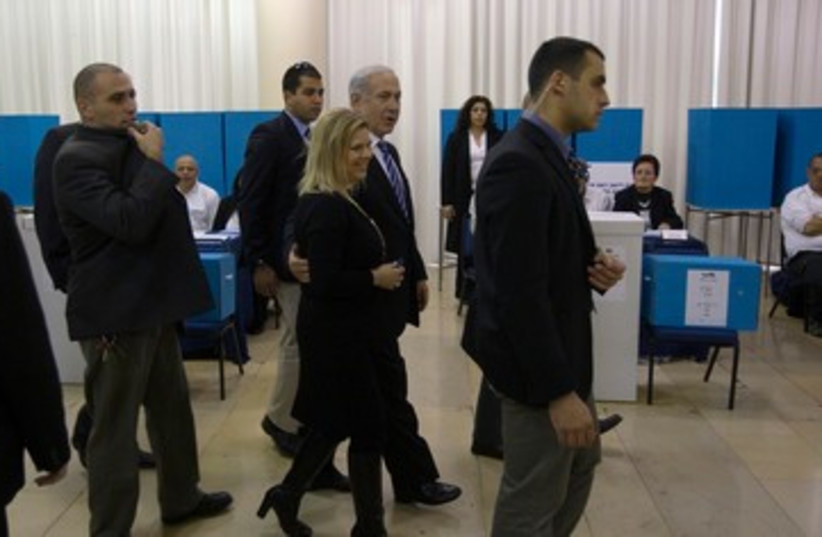 Netanyahu votes in Likud primary 390 (photo credit: REUTERS)