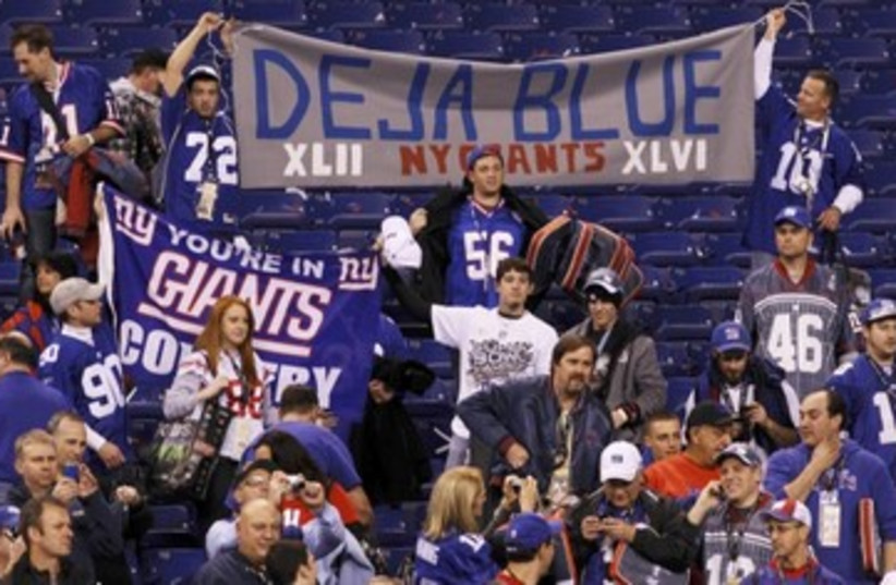 New York Giants fans celebrate Super Bowl win_390 (photo credit: Reuters)