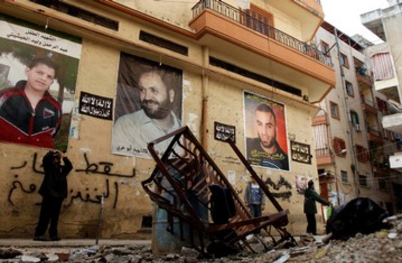 Aftermath of Lebanon street battle 390 (photo credit: REUTERS)