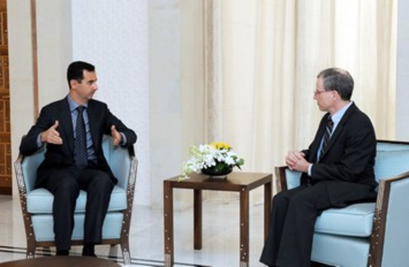Robert Ford and Assad 390 (photo credit: REUTERS/Sana Sana)