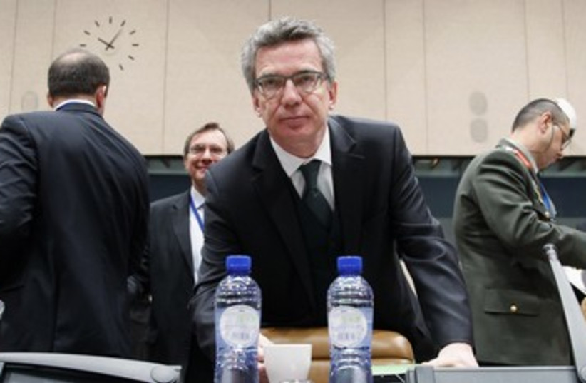 German Defense Minister Thomas de Maiziere 390 (R) (photo credit: Francois Lenoir / Reuters)