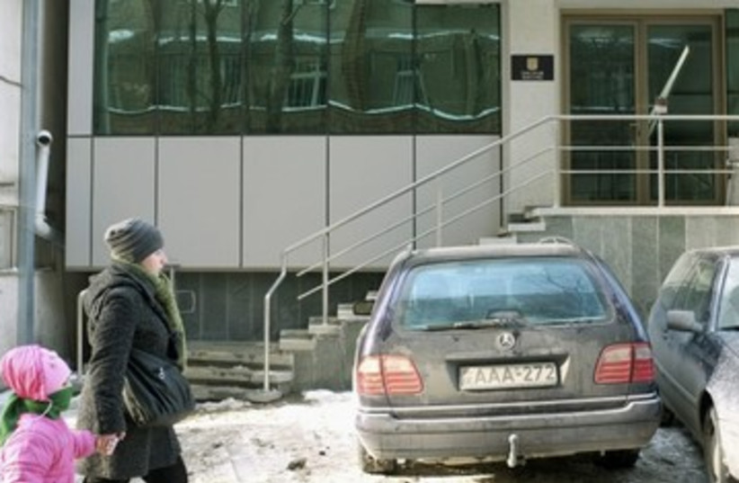 People walk by Israel embassy in Tbilisi, Georgia_390 (photo credit: Reuters)