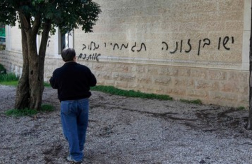 Vandalized Baptist Church in Jerusalem  390 (photo credit: REUTERS)