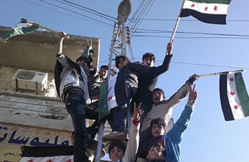 Syria anti-Assad protest 370 R (photo credit: REUTERS/Handout)