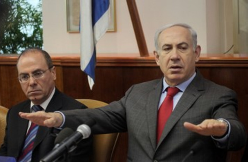 Netanyahu superman hands ata cabinet meeting 390 (photo credit: Marc Israel Sellem)