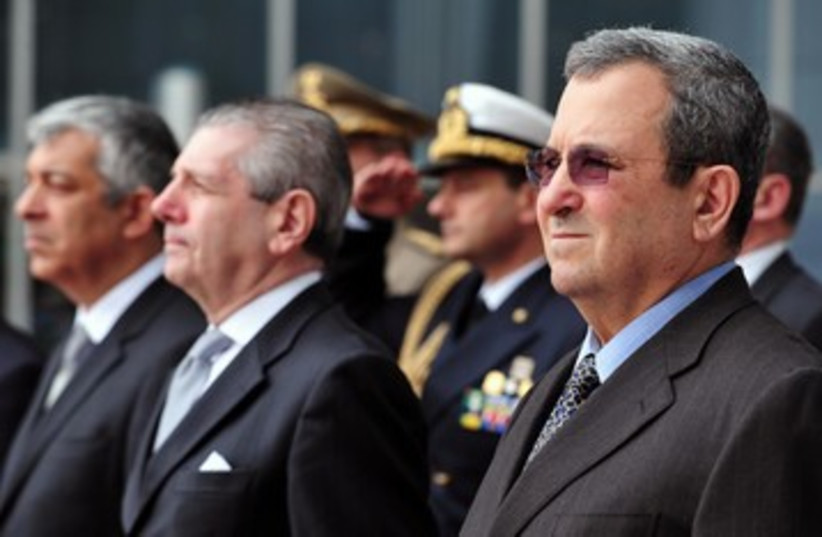 Defense Minister Barak with Italian defense minister 390 (photo credit: Ariel Harmoni / Defense Ministry)