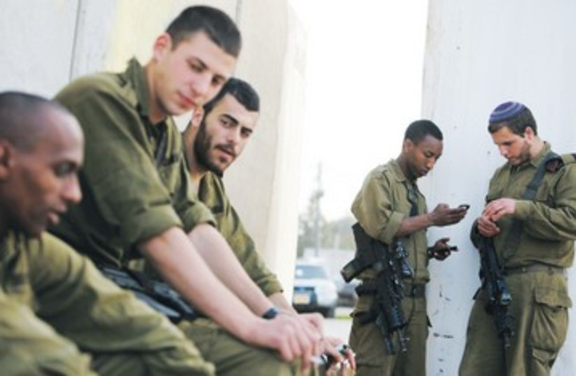 IDF soldiers resting 390 (photo credit: REUTERS)