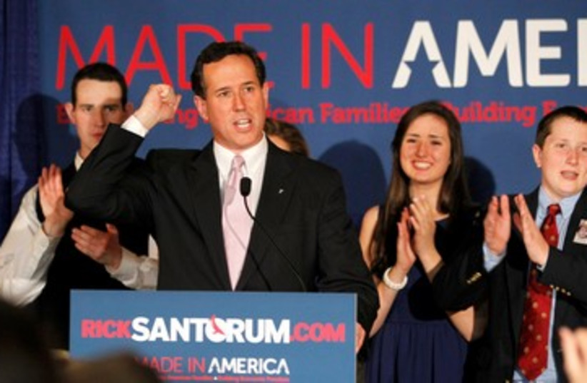 Rick Santorum celebrating 390 (photo credit: Reuters/ Mike Stone)