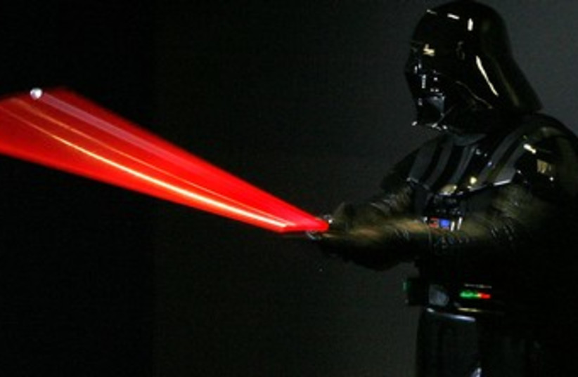 Darth Vader quits (photo credit: REUTERS/DANIEL MUNOZ)