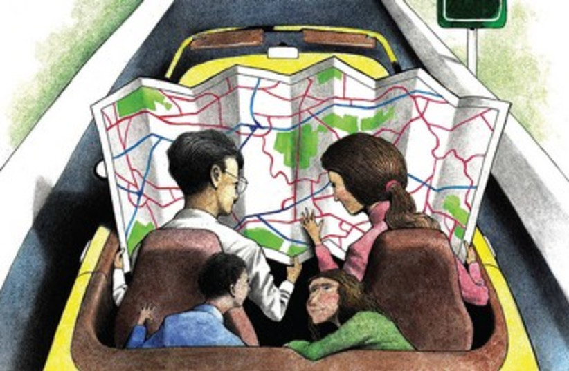 illustration of family holding map 390 (photo credit: MCT)