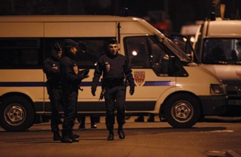 French police in Toulouse (night)_370 (photo credit: Jean-Paul Pelissier/Reuters)