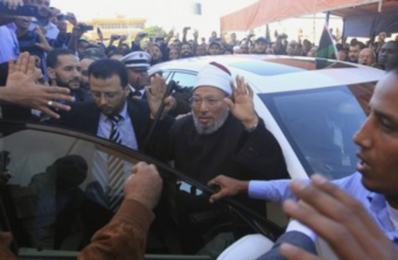 Yusuf Qaradawi arrives for Friday prayers_370 (photo credit: Esam Al-Fetori/Reuters)