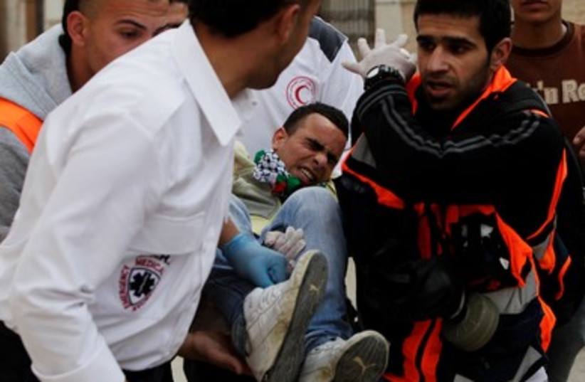 Palestinian Land Day protester injured in Kalandia