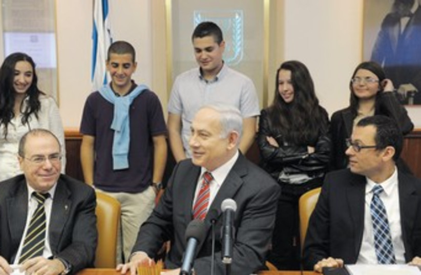 PM with 5 winners of ‘Next Generation’s Government’ contest  (photo credit: Avi Ohayon/GPO)
