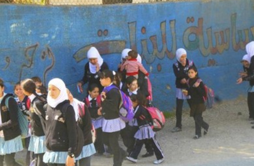 Palestinian girls leave Hebron school