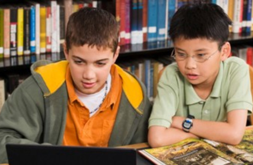 Children studying in a library 370 (photo credit: Thinkstock/Imagebank)