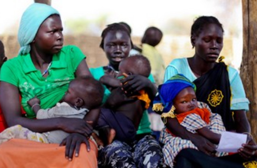 Sudanese refugees in Doro refugee camp 370 R (photo credit: REUTERS)