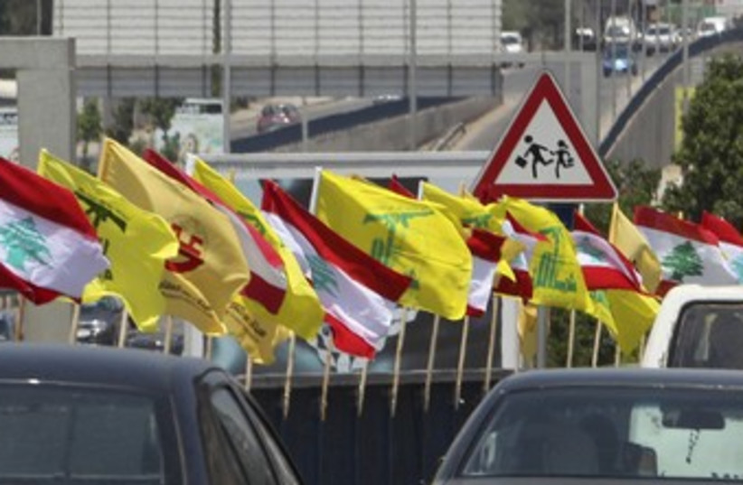 Hezbollah, Lebanon flags near Beirut airport 370 (photo credit: REUTERS/Sharif Karim)